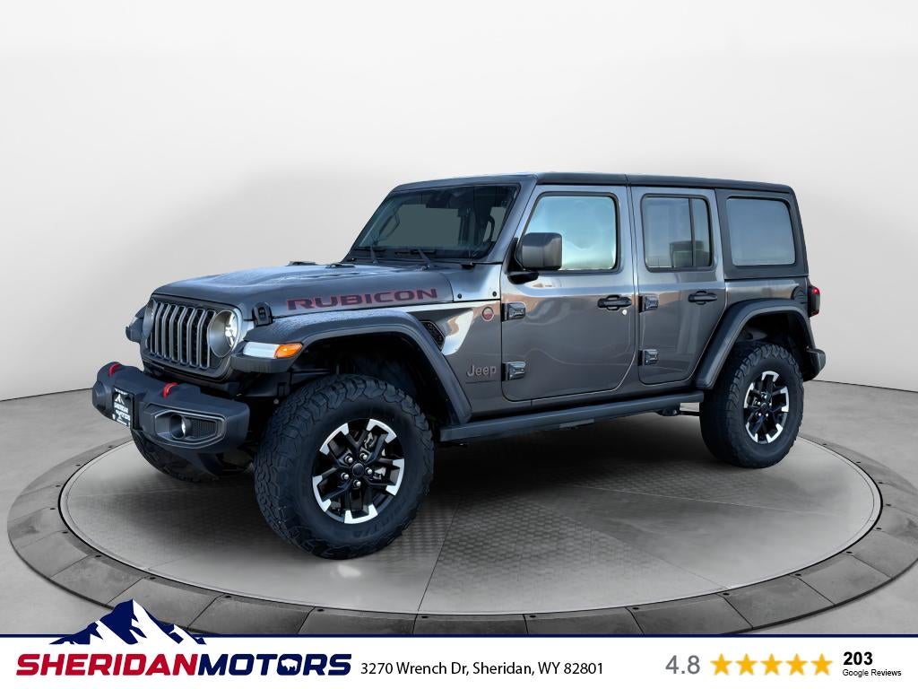2025 Jeep Wrangler 4-Door Rubicon 4x4 in Granite Crystal Metallic Clearcoat — front three-quarter view