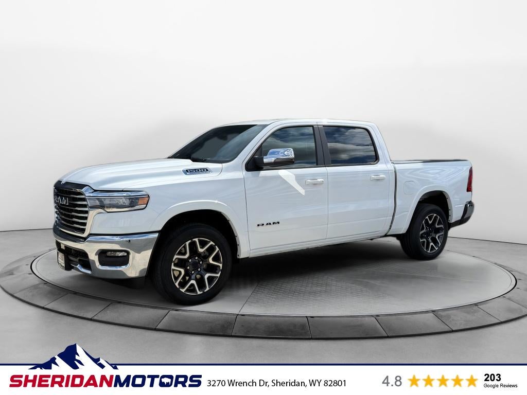 2026 RAM Ram 1500 RAM 1500 LARAMIE CREW CAB 4X4 5'7' BOX in Bright White Clear-Coat Exterior Paint — front three-quarter view