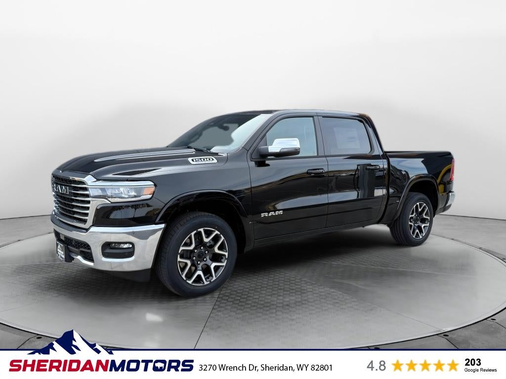 2026 RAM Ram 1500 RAM 1500 LARAMIE CREW CAB 4X4 5'7' BOX in Diamond Black Crystal Pearl-Coat Exterior Paint — front three-quarter view
