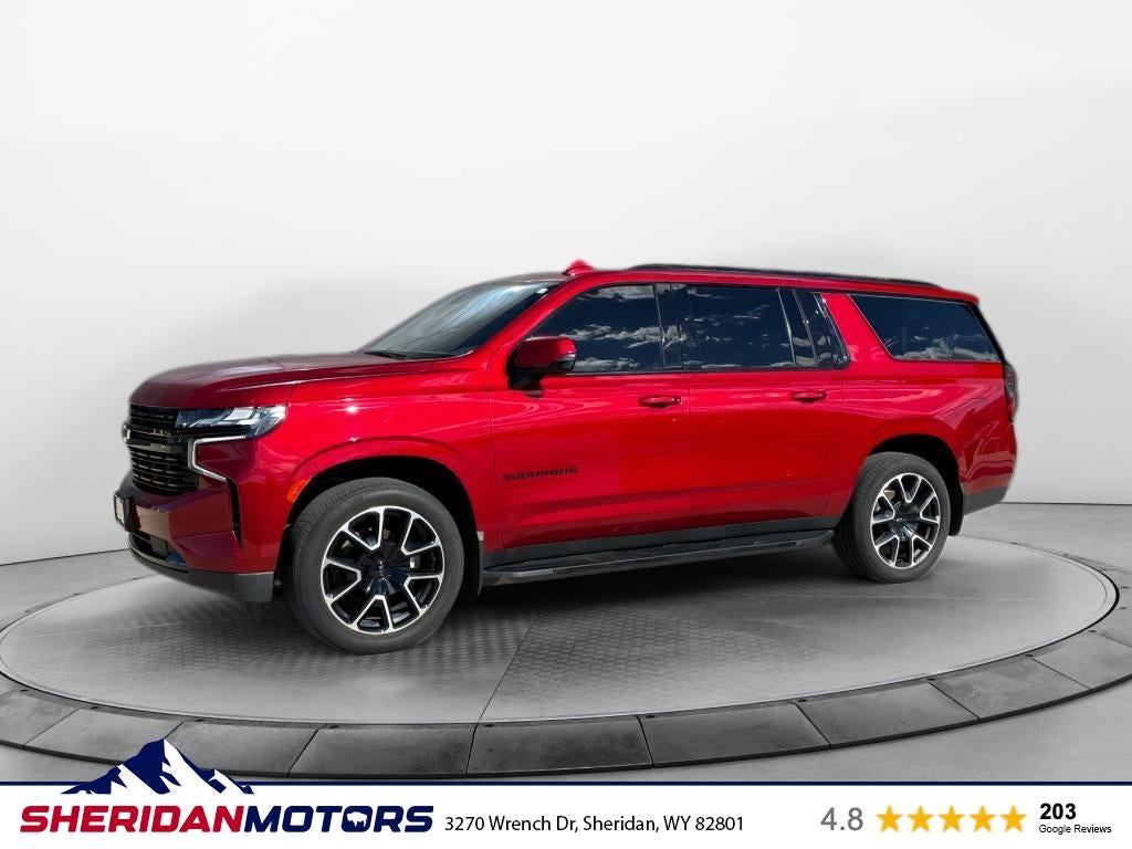 2023 Chevrolet Suburban 4WD RST in Radiant Red Tintcoat — front three-quarter view