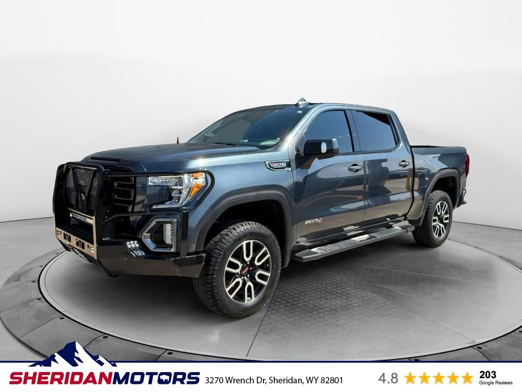 2019 GMC Sierra AT4 in Dark Sky Metallic — front three-quarter view