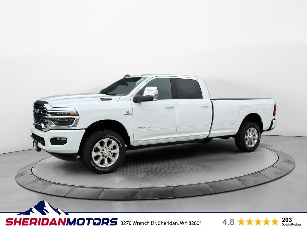 2026 RAM Ram 3500 RAM 3500 LARAMIE CREW CAB 4X4 8' BOX in Bright White Clear-Coat Exterior Paint — front three-quarter view