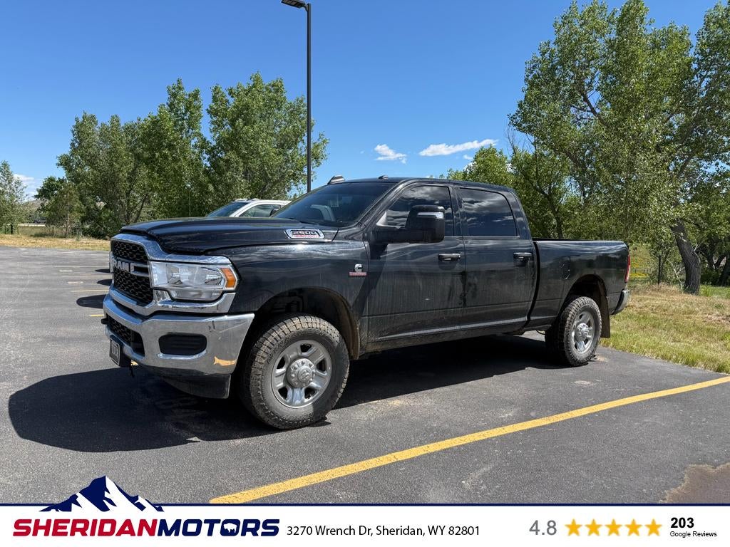 2023 RAM 2500 Tradesman Crew Cab 4x4 6'4' Box in Diamond Black Crystal Pearlcoat — front three-quarter view