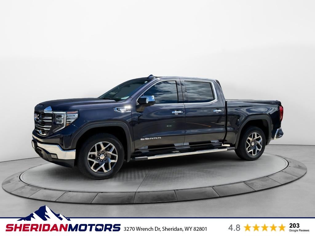 2025 GMC Sierra 1500 4WD Crew Cab Short Box SLT in Titanium Rush Metallic — front three-quarter view