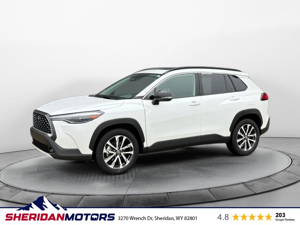 2025 Toyota Corolla Cross XLE in Wind Chill Pearl — front three-quarter view
